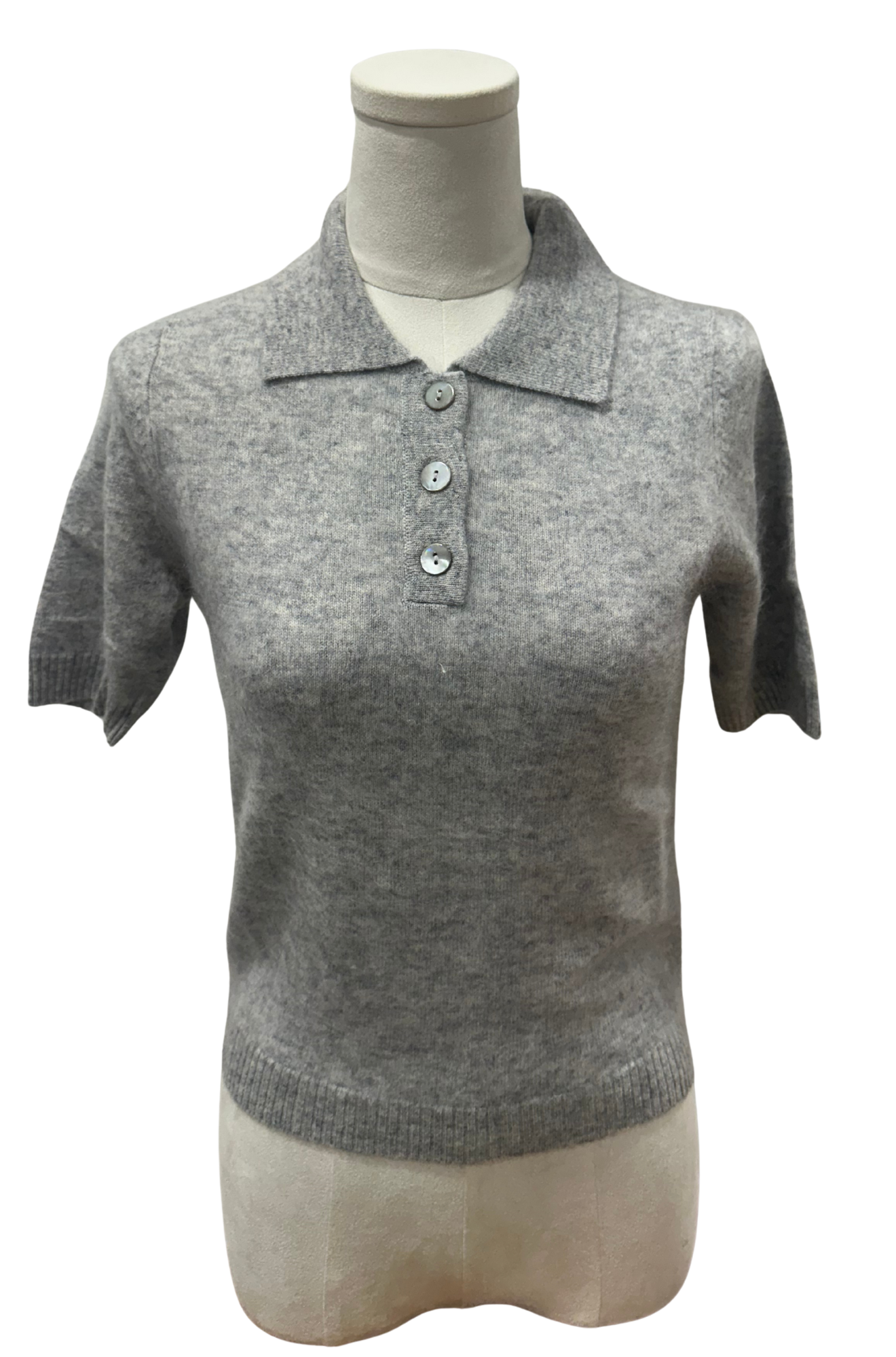 Gray short-sleeve knitted polo shirt on a mannequin against a white background