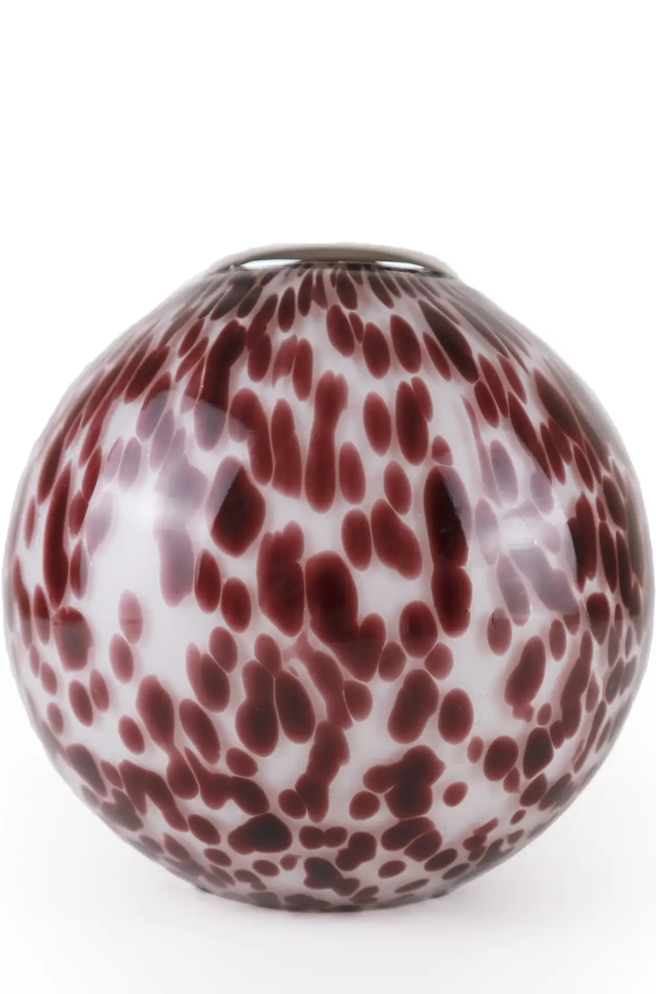 Decorative glass spherical match holder and striker with red and white marbled pattern on a white background